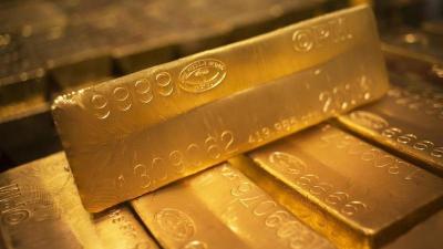 Vàng thế giới tăng sau khi Fed phát tín hiệu ngừng nâng lãi suất
