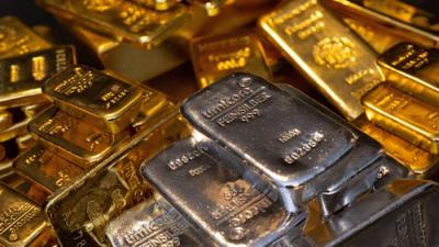 Vàng thế giới giảm khi đồng USD tăng sau dữ liệu kinh tế lạc quan của Mỹ